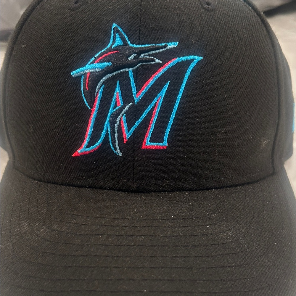 New Era Black Hat with Blue and Red Logo